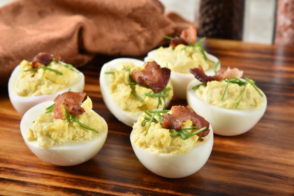 deviled eggs with bacon and chives - grillers gold easter feast blog