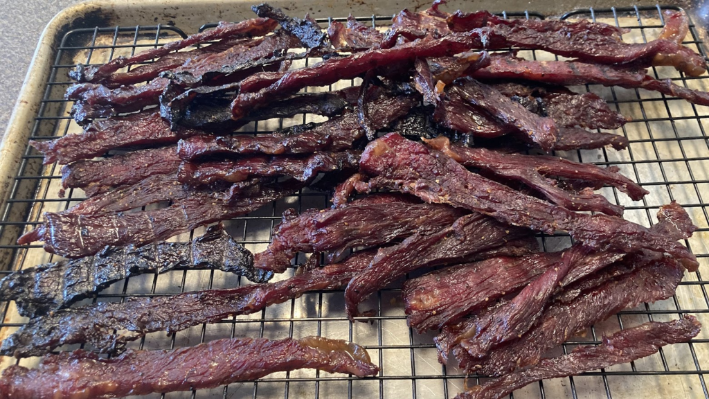 finished jerky off the grill - summer snacks on the smoker