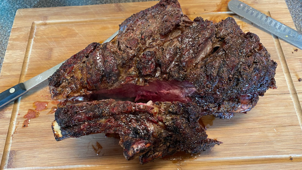 grilled ribeye on a bamboo cutting board - Griller's Gold Blog