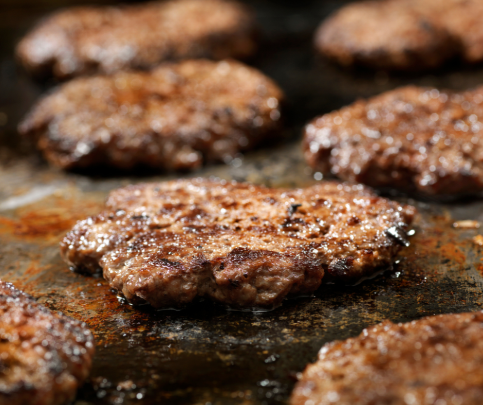 close up of a smashburger on the griddle